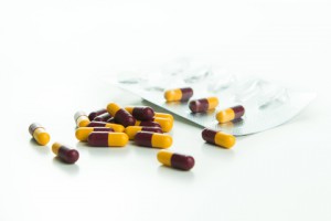 yellow and red tablets with packet