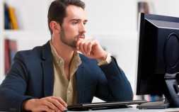 Man sat in front of computer